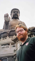 Liam Mitchell posed in front of the world�s largest seated bronze Buddha at the Po Lin Monastery on Lantau Island. 