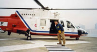 Liam Mitchell prepares to board a Government Flying Service helicopter.
