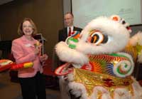 Ms. Mary Hofstetter, President and CEO of the Banff Centre, dotting the lion's eyes at the MOU signing ceremony between the Centre and Hong Kong Cyberport Management Company Limited. 