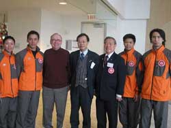 The Director of the HKETO, Mr Bassanio So (middle) and some of the members of the Hong Kong Wushu Delegation met with Deputy Mayor of Edmonton, Mr Michael Phair (3rd from left) during their visit to the Edmonton City Hall in February.