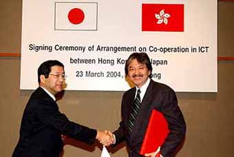Japanese Vice-Minister for Policy Co-ordination of Home Affairs, Posts & Telecommunications Kozo Takahara and hong Kong's Secretary for Commerce, Industry & Technology John Tsang (right) signed the first arrangement on co-operation in the development of information and communications technology.