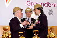 John Tsang and Mike Rowse participate in the ground-breaking ceremony for AsiaWorld-Expo, which will provide the largest column-free exhibition halls in Hong Kong.