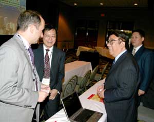 Mr Mei Ping, the former Chinese ambassador to Canada, in his capacity as the Chair of China National Committee for Pacific Economic Cooperation, attends the 2006 National HKCBA Business Forum in Winnipeg with a eight-member delegation from China.