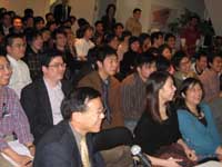 HKETO Director Mr Bassanio So (left, 1st row) sharing a lighter moment with the Toronto participants at the 4th cross-Pacific video conference on career opportunity in Hong Kong. 