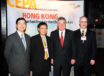 Federal Industry Minister the Hon David Emerson (2nd right)  and HKETO Director Mr Bassanio So (2nd left) urge Canadian business people to explore the China market by leveraging the Hong Kong advantages at the opening of the business forum.