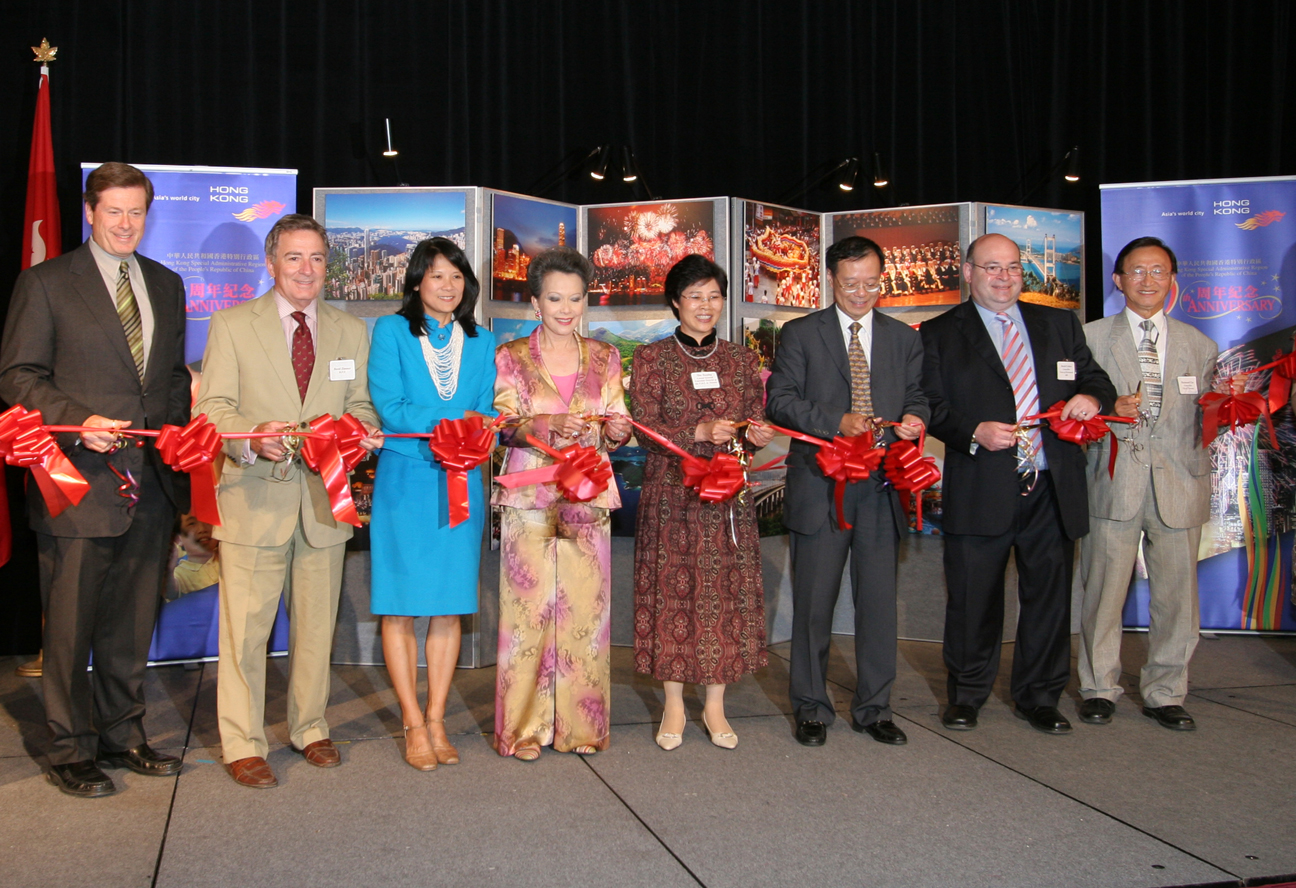 Dignitaries joining the HKETO DirectorMr Bassanio So (3rd from right), at the Toronto reception's ribbon-cutting ceremony are (from left to right): Leader of Official Opposition in Ontario, John Tory; Members of the Ontario Parliament David Zimmer; Member of Parliament Olivia Chow; Senator Vivienne Poy; Consul General of the People's Republic of China in Toronto, Madam Zhu Taoying; Town of Richmond Hill Councillor, David Cohen;  and Toronto City Councillor, Raymond Cho.