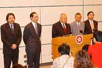 CE Tung Chee Hwa announces the appointment of Henry Tang (to his left) as the new FS and Ambrose Lee (to his right) as S for S. John Tsang (far left) replaces Mr Tang as SCIT, while Commissioner of Customs & Excise Raymond Wong (far right) has been named Mr Lee's replacement as head of the ICAC.