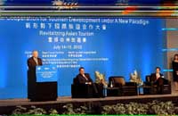 CE  Tung Chee Hwa gives a speech at the Boao Forum. Also on the stage are Secretary-General of the World Tourism Organisation Mr Francesco Frangialli and Secretary-General of the Boao Forum of Asia Mr Long Yongtu. 