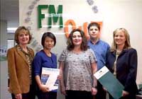HKFF grand prize winner Mrs Renae Hnidan of Calgary (center) was presented with a 5-star visit package to experience the dynamism of Hong Kong.