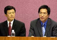 Deputy Secretary for Security Michael Wong (right) says the HKSARG  has taken into account the flexibility of Hong Kong's property and financial markets in devising the scheme.