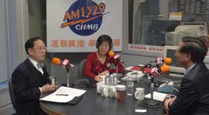 The Chief Executive, Mr Donald Tsang (left), explains to Legislative Councillor, Mr Alert Cheng (right), and  Radio AM1320's Chief Executive, Ms Teresa Wat,  Hong Kong's constitutional development when attending the radio station's interview.