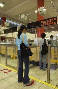 More than 300 overhead infrared temperature scanners and medical posts are in place to scan passengers' body temperature against the re-surge of SARS.