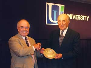 Hong Kong's Director-General of Investment Promotion, Mr Mike Rowse (left), presented a souvenir plaque to the Chancellor of the University of Ulster, Sir Richard Nichols,  in Hong Kong. 