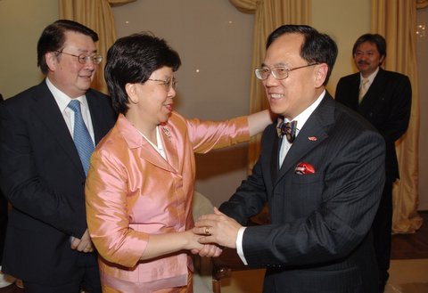 The Chief Executive, Mr Donald Tsang, congratulates former Director of Health, Dr Margaret Chan, for being appointed as the Director-General of the World Health Organization. 