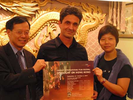 Picture shows the HKETO Director Mr Bassanio So (left), the CIFF Director Mr David Marrelli (middle), and Ms Carol Lai (right), the film director of <The Floating Landscape>, displaying the "Spotlight on Hong Kong" poster at today's press conference.